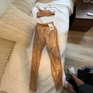 Fabletics sports bra and workout pants sets, gold, size for extra small. New